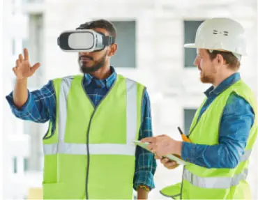 Trabajadores de la construcción utilizando realidad virtual para visualizar un proyecto